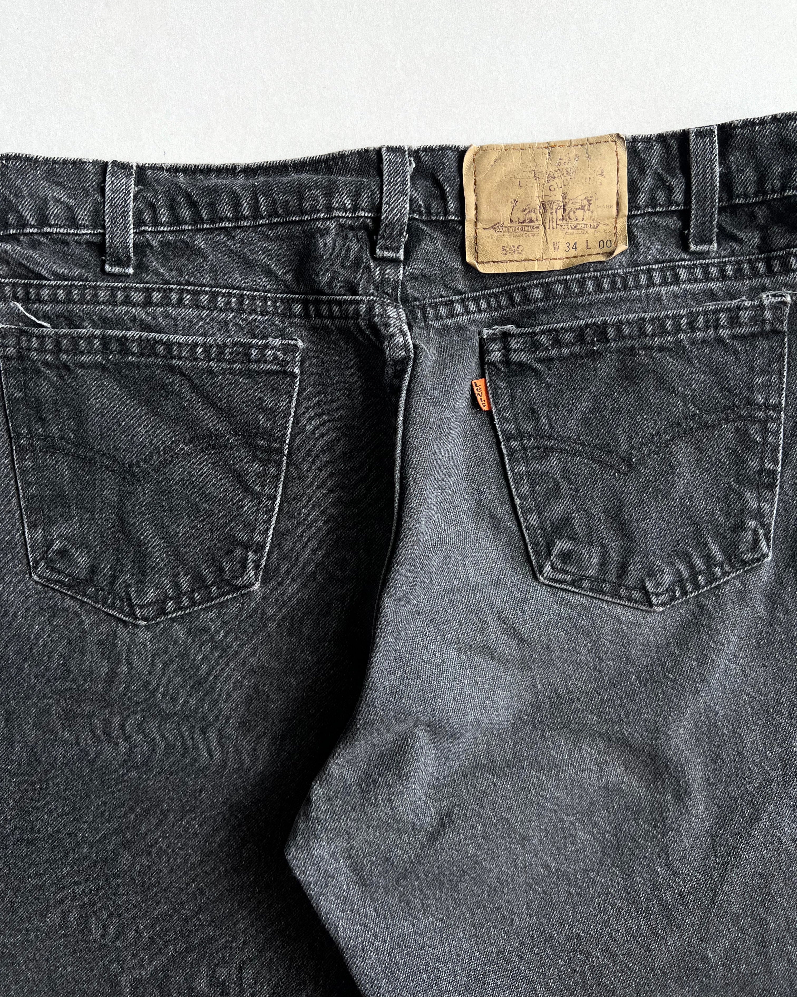 1990S FADED BLACK LEVI'S 550 SHORT S (34X00)