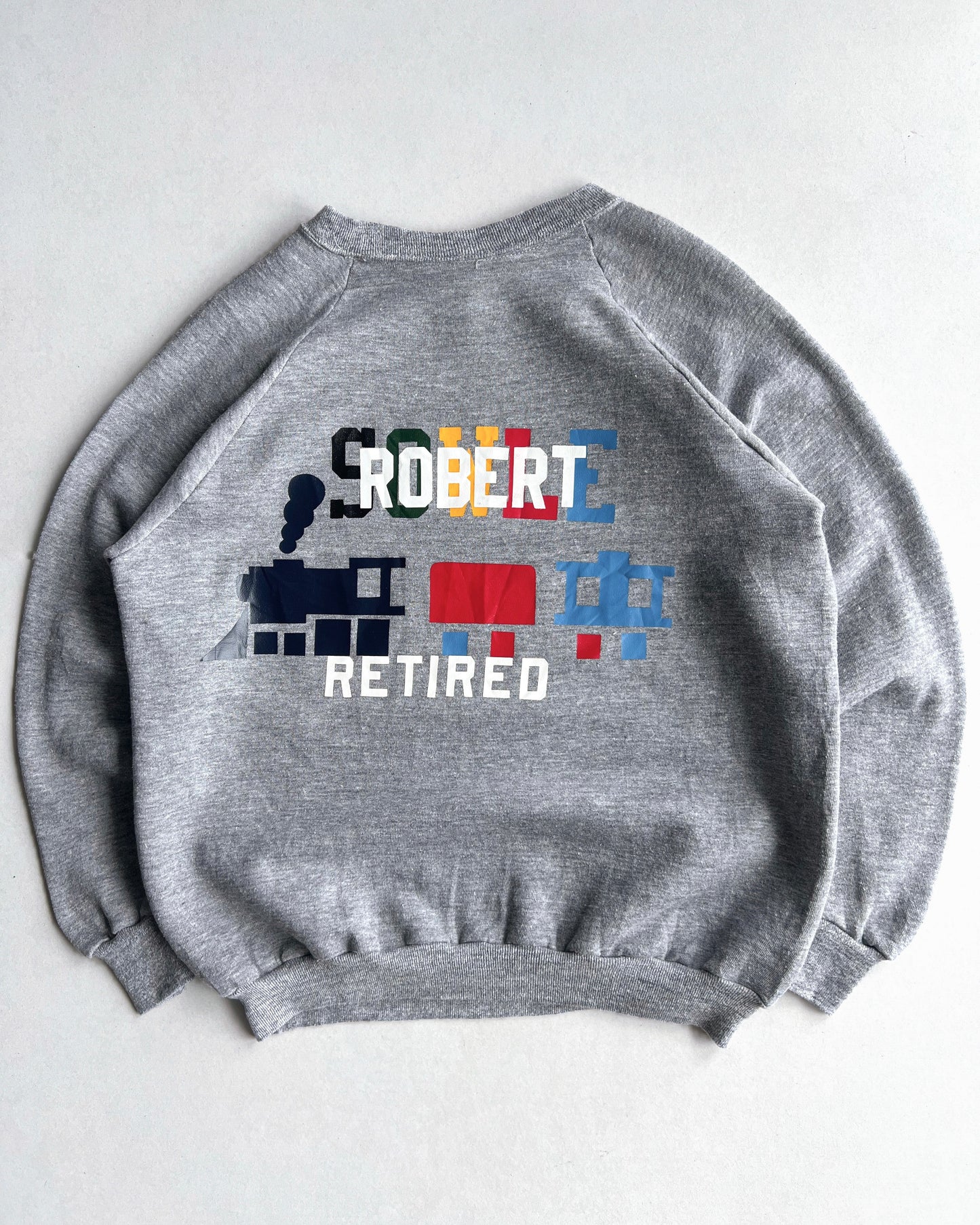 1970S RUSSELL 'ROBERT RETIRED' RAGLAN SWEATSHIRT (XL)