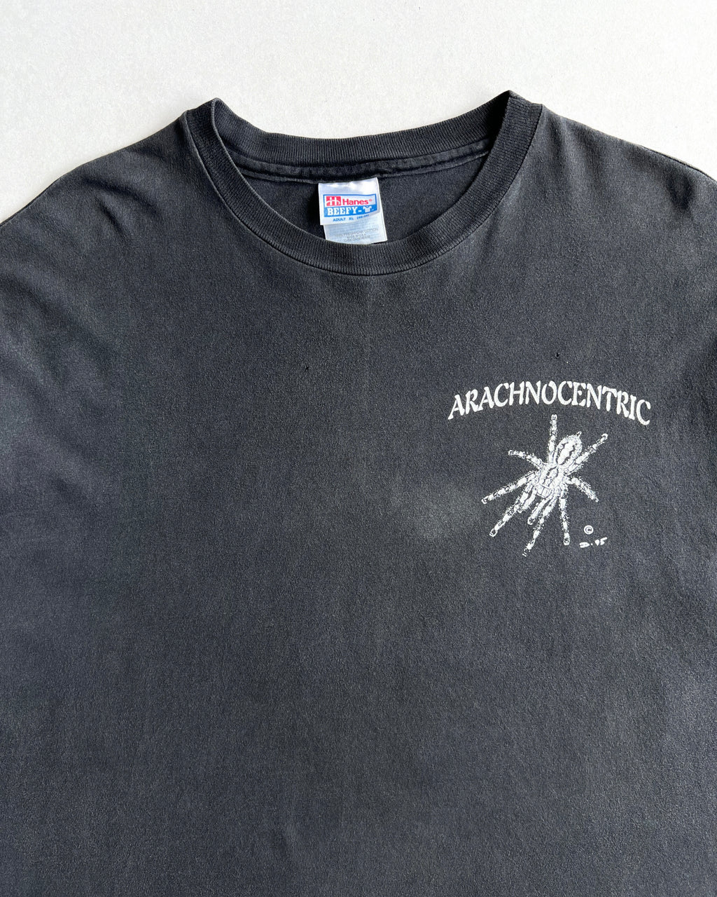 1990S FADED BLACK 'ARACHNOCENTRIC' SINGLE STITCH TEE (XL)