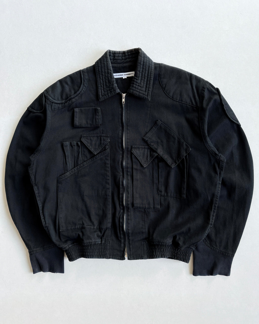 1980S BLACK KATHARINE HAMNETT CARGO BOMBER (M)