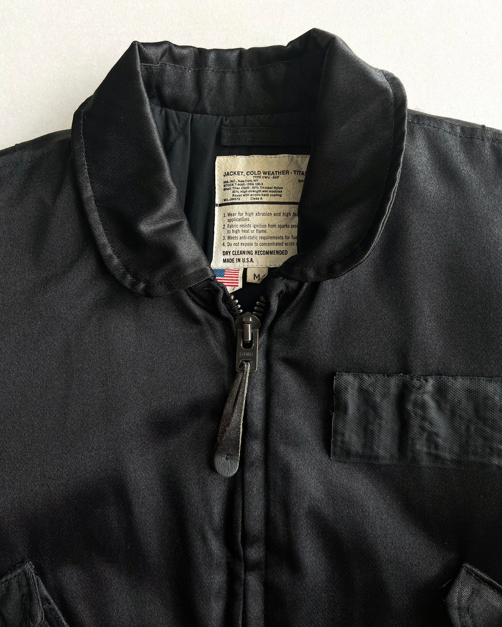 1980S BLACK COATED CWU-55/P BOMBER JACKET (M)