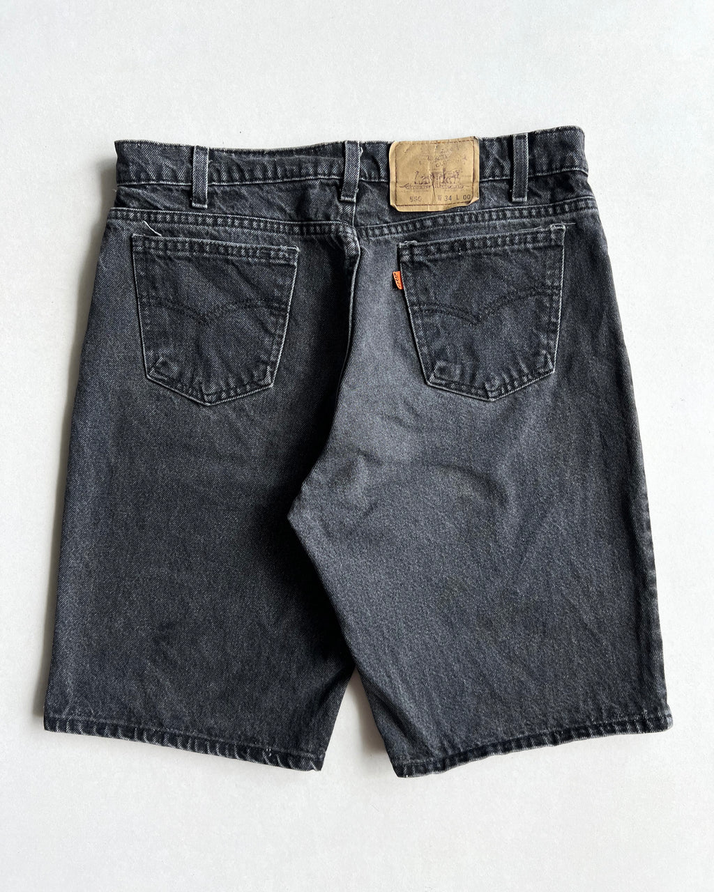 1990S FADED BLACK LEVI'S 550 SHORT S (34X00)