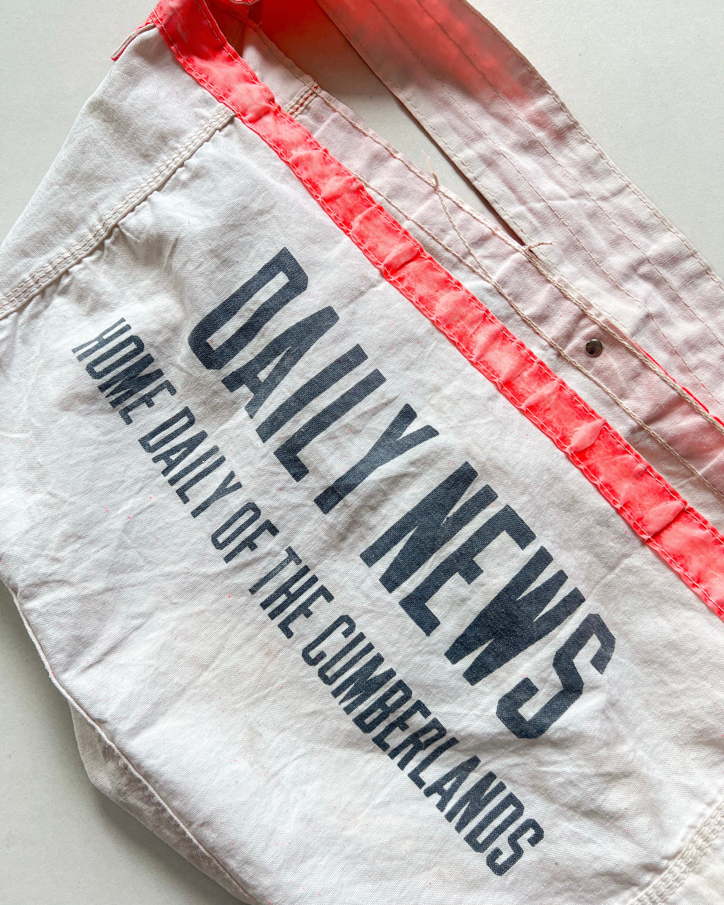 1960S 'DAILY NEWS OF CUMBERLANDS' NEWSPAPER BAG (OS)