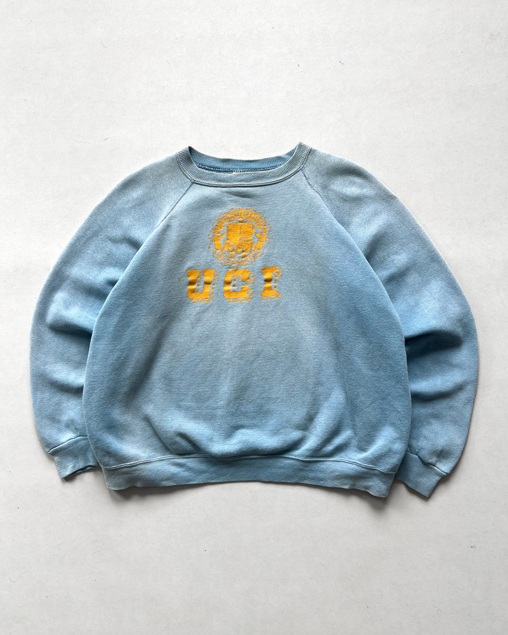 1960S FADED 'UCI' RAGLAN SWEATSHIRT (XL)