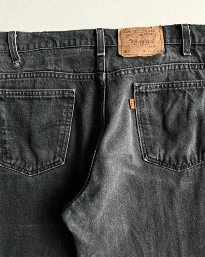 1990S FADED BLACK LEVIS 517 FLARE JEANS (34X34)