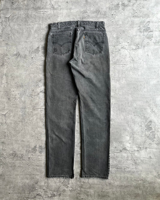 1990S FADED BLACK LEVI'S 505 REPAIRED JEANS (34X34)