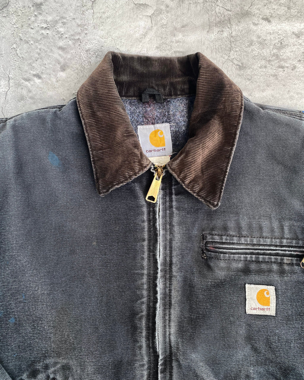 1990S SUN FADED BLACK CARHARTT DETROIT JACKET (S-L)