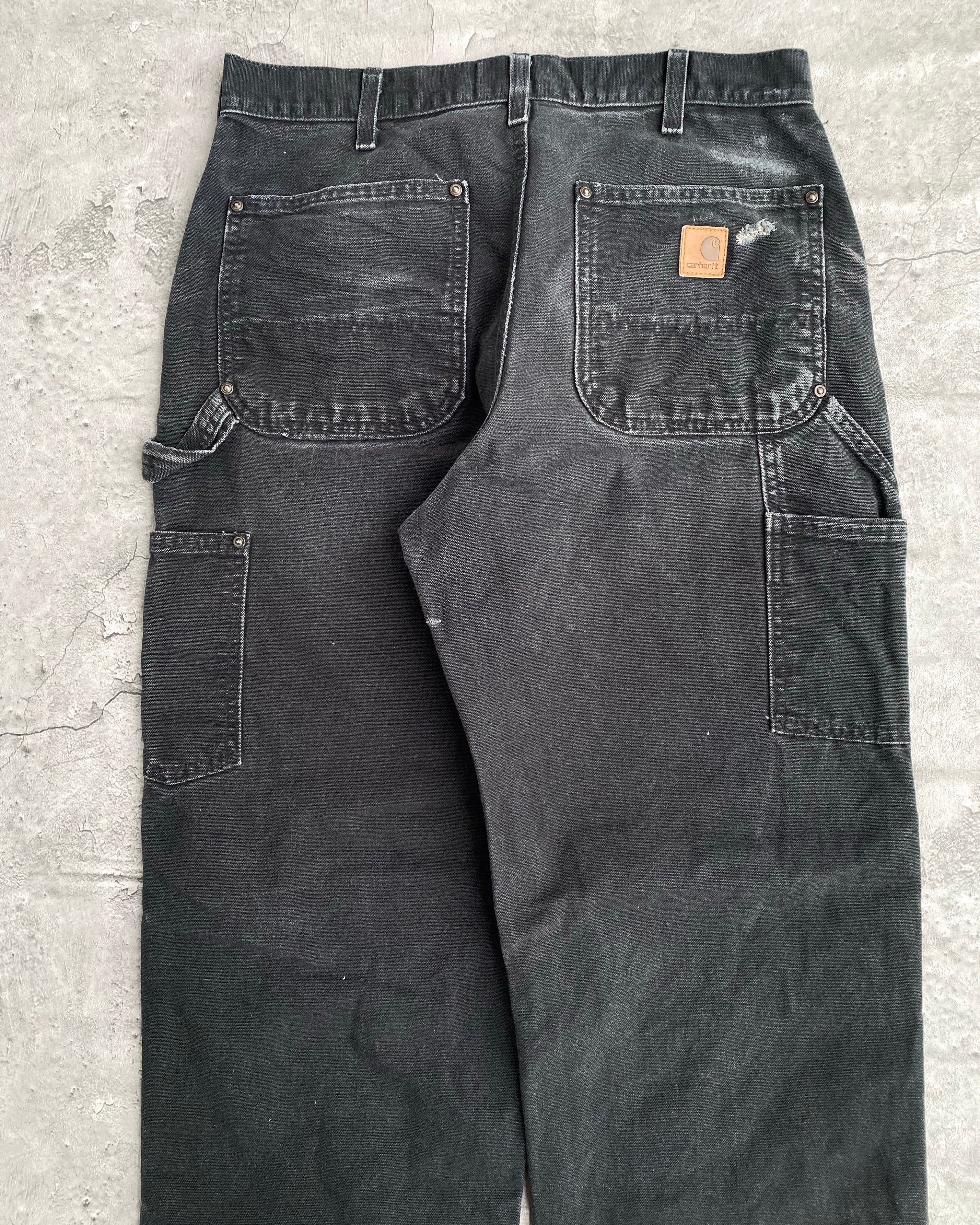 1990S FADED BLACK CARHARTT REPAIRED DOUBLE KNEE PANTS (32X30)