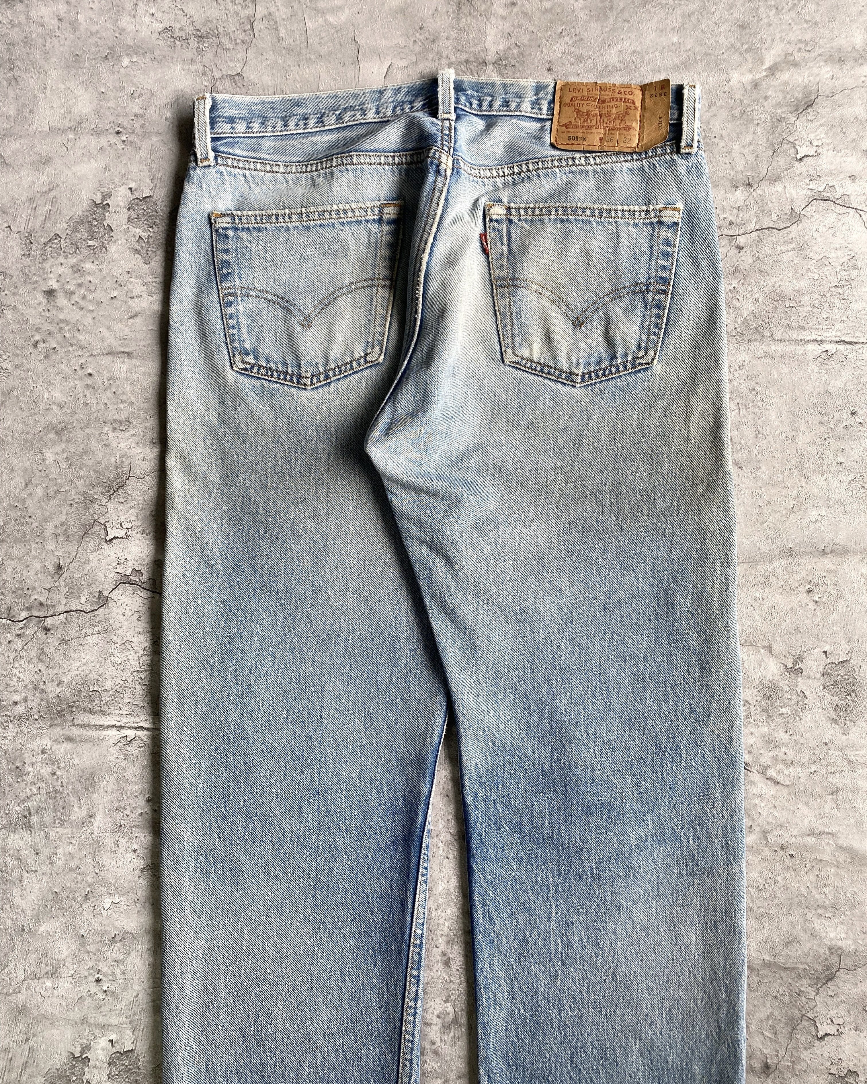 1990S FADED WASH LEVI'S 501 REPAIRED JEANS (36X32)