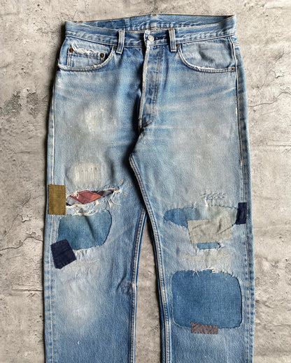 1980S FADED WASHED LEVI'S 501 PATCHED JEANS (33x38)