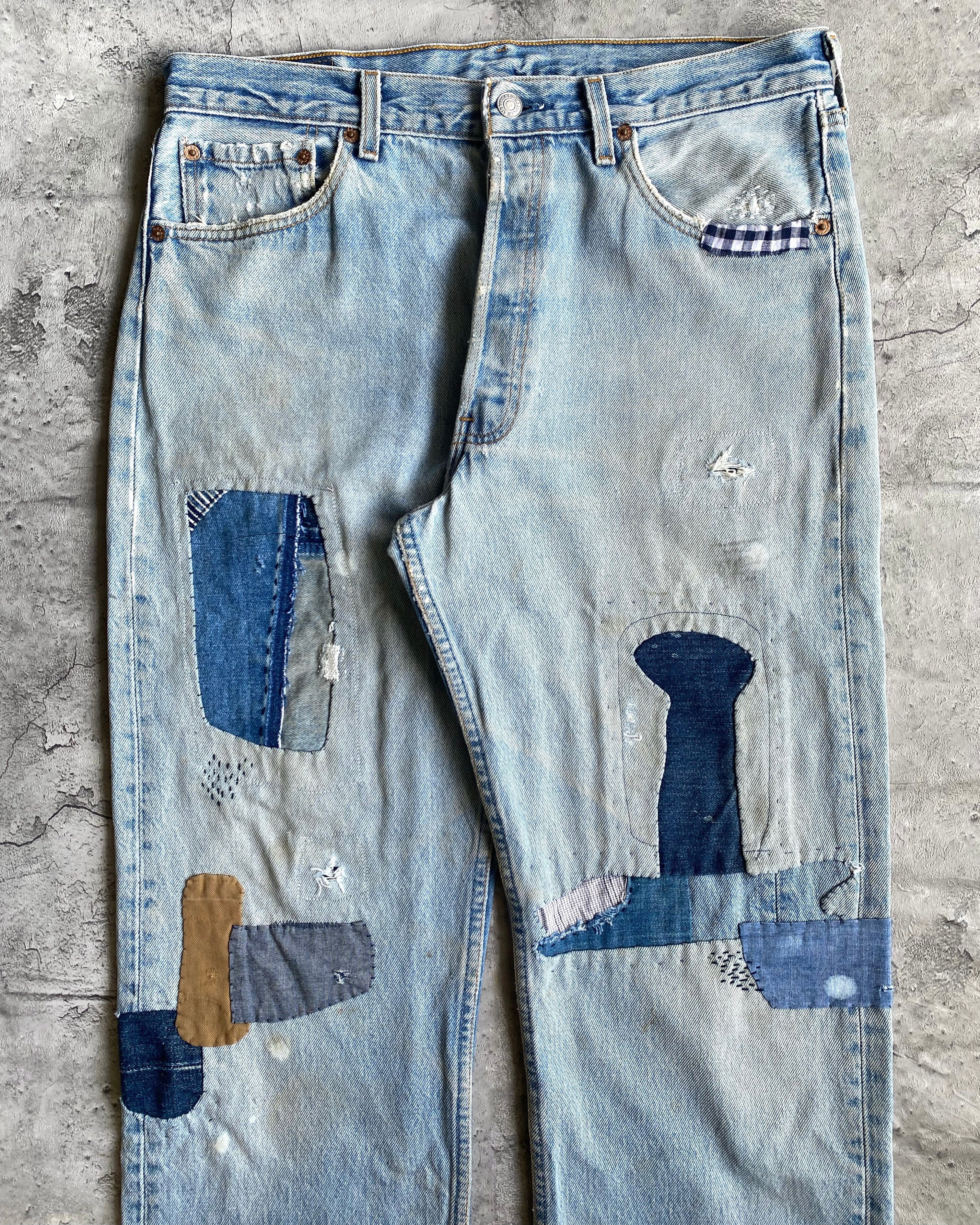 1990S FADED WASHED LEVI'S 501 PATCHED JEANS (34X34)