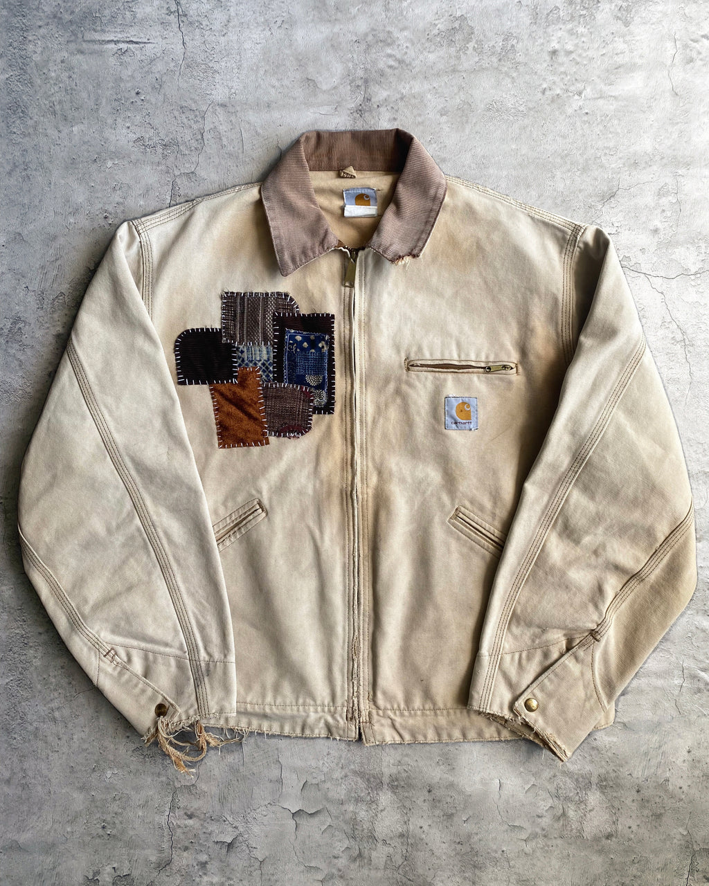 1990S FADED CARHARTT PATCHED DETROIT JACKET (L-XXL)