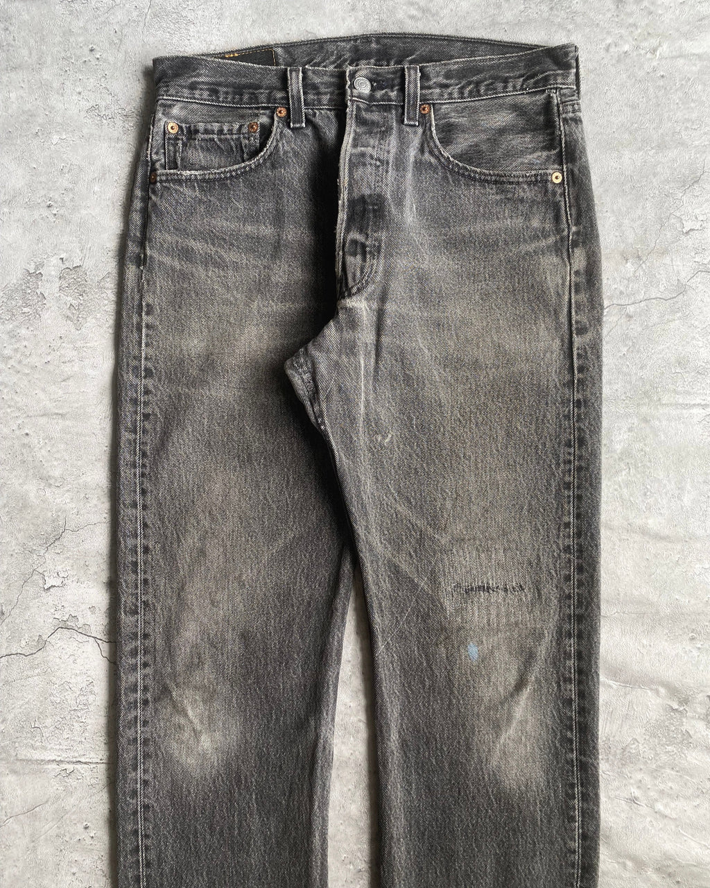 1990S REPAIRED BLACK LEVI'S 501 RELEASED HEM JEANS (31X32)