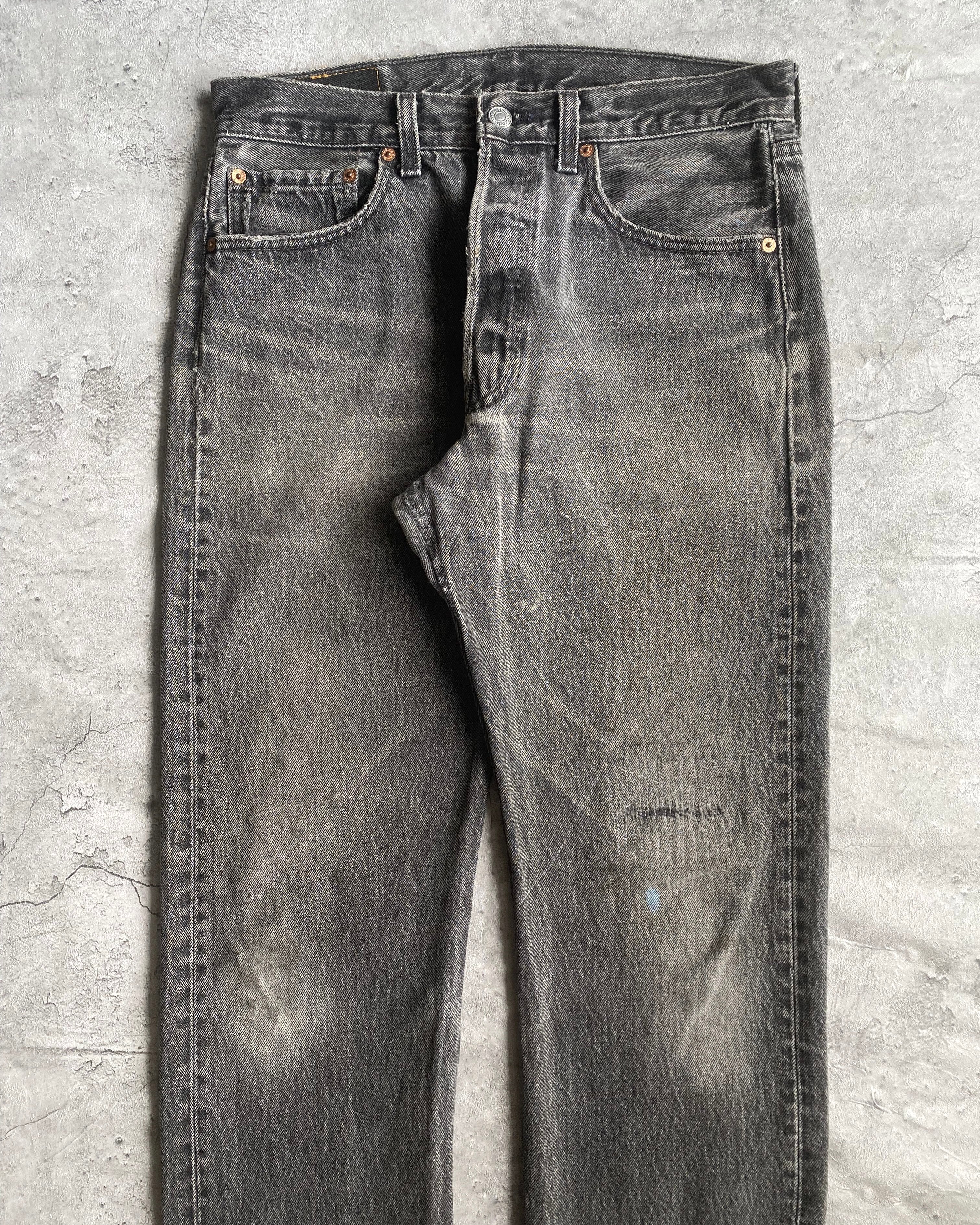 1990S REPAIRED BLACK LEVI'S 501 RELEASED HEM JEANS (31X32)