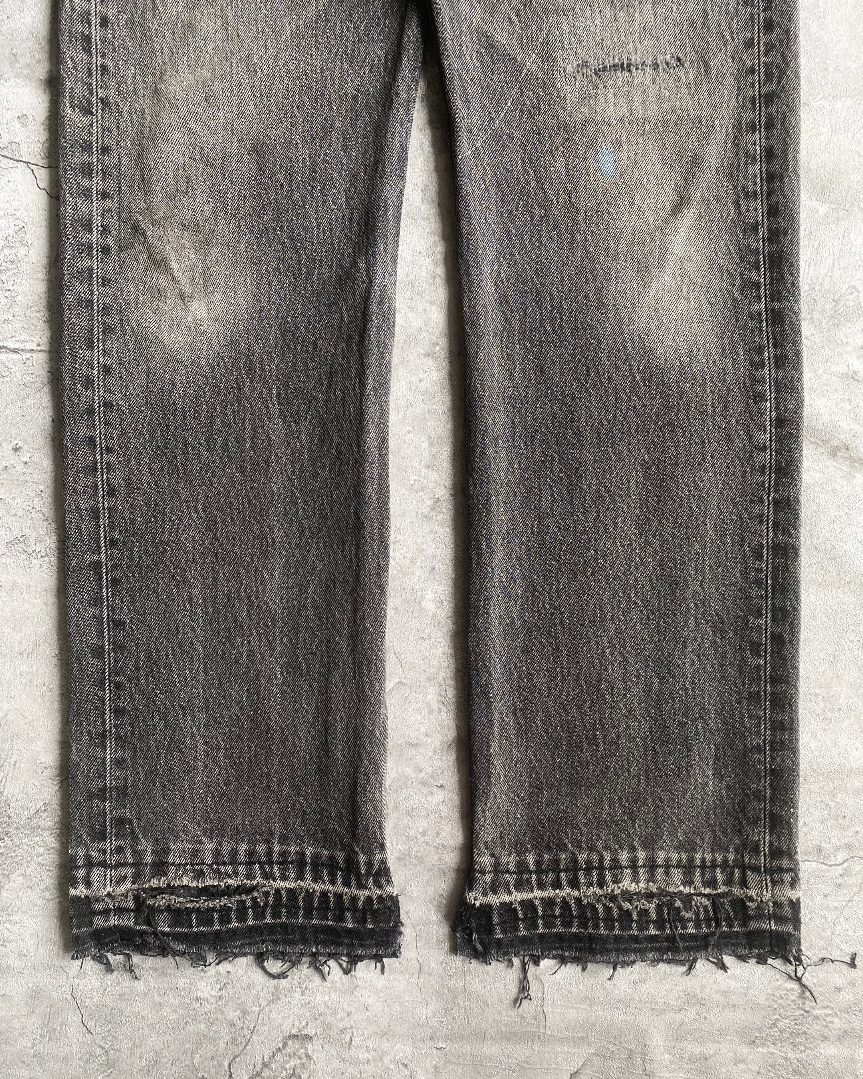 1990S REPAIRED BLACK LEVI'S 501 RELEASED HEM JEANS (31X32)