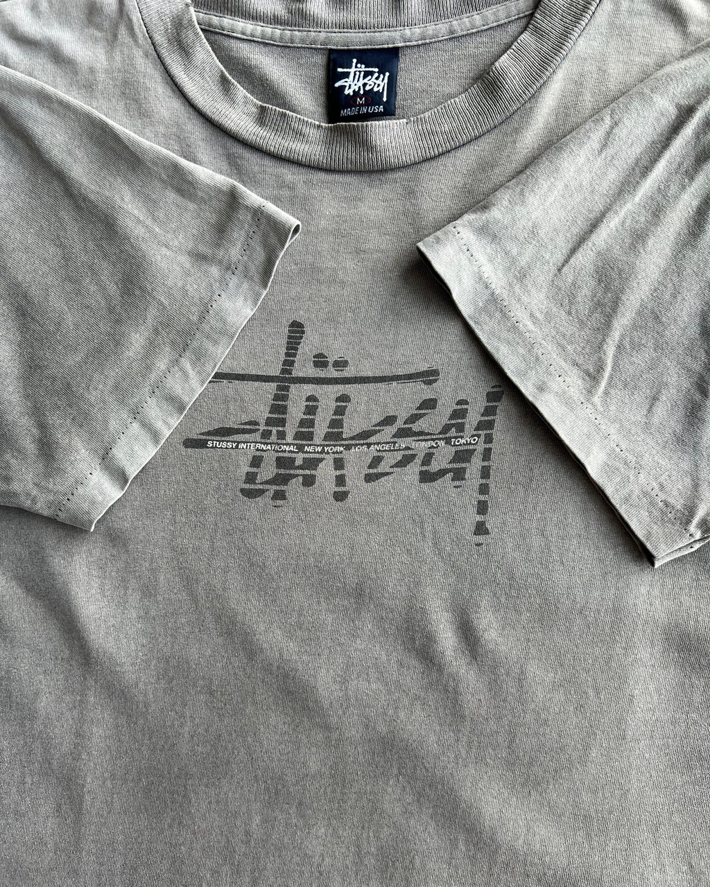 1990S SUN FADED STUSSY INTERNATIONAL SINGLE STITCH TEE (M)