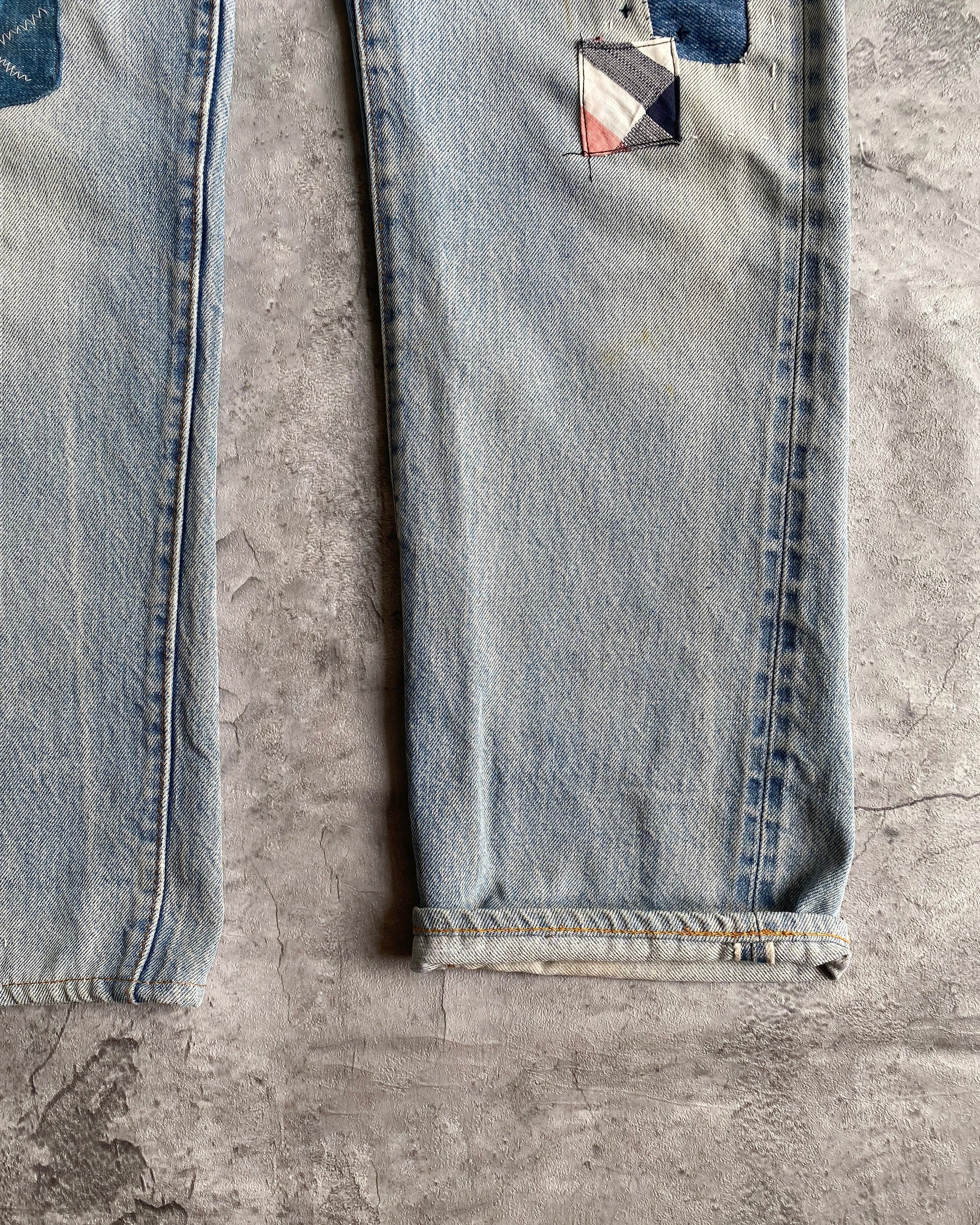 1980S FADED BLUE LEVI'S 501 REDLINE SELVEDGE REPAIRED JEANS (32X31)