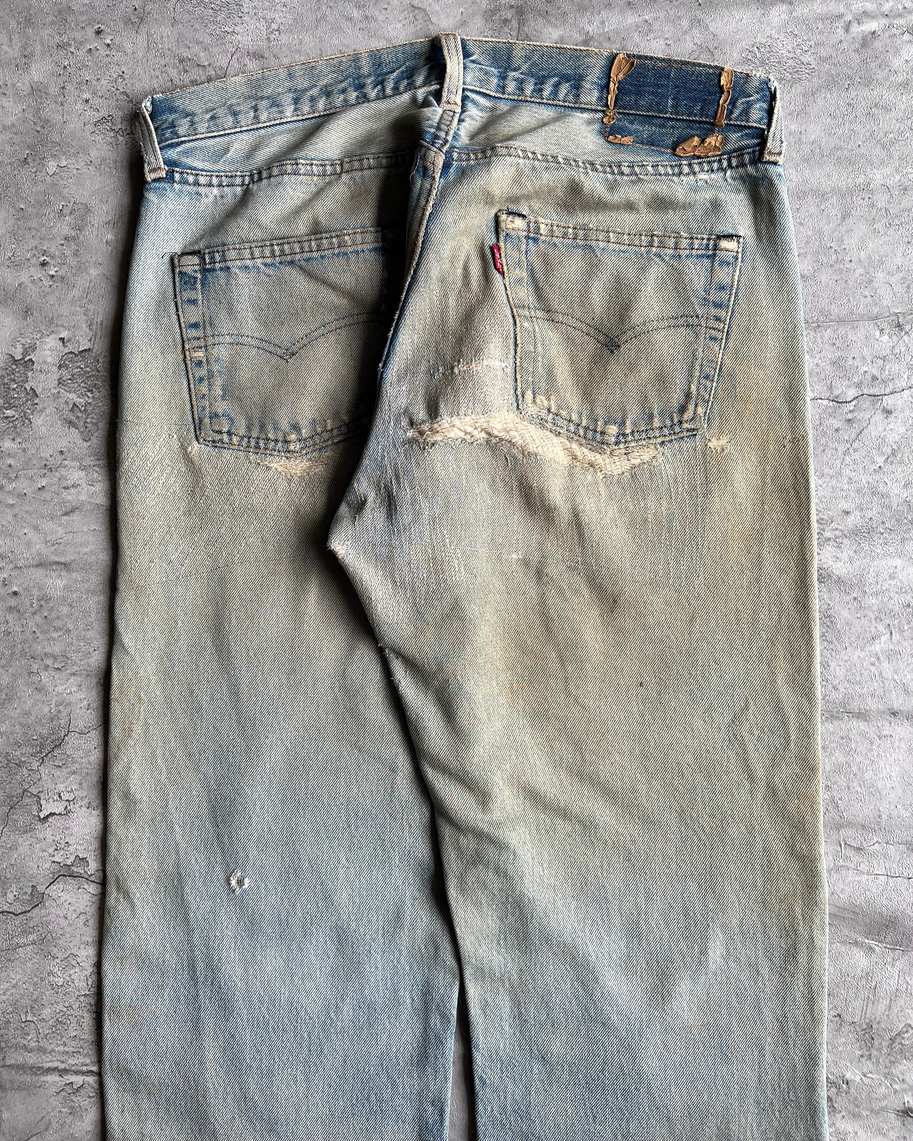 1980S FADED BLUE LEVI'S 501 REDLINE SELVEDGE REPAIRED JEANS (33X31)