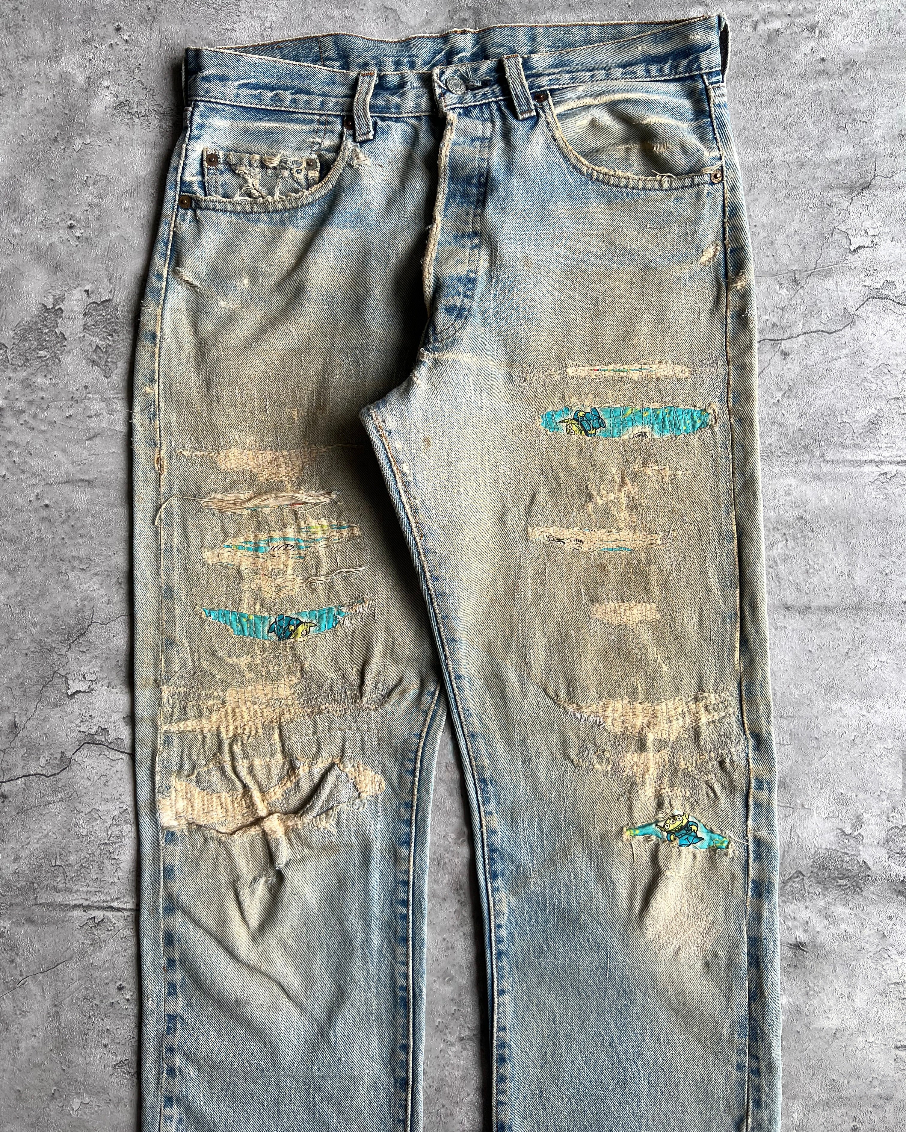 1980S FADED BLUE LEVI'S 501 REDLINE SELVEDGE REPAIRED JEANS (33X31)