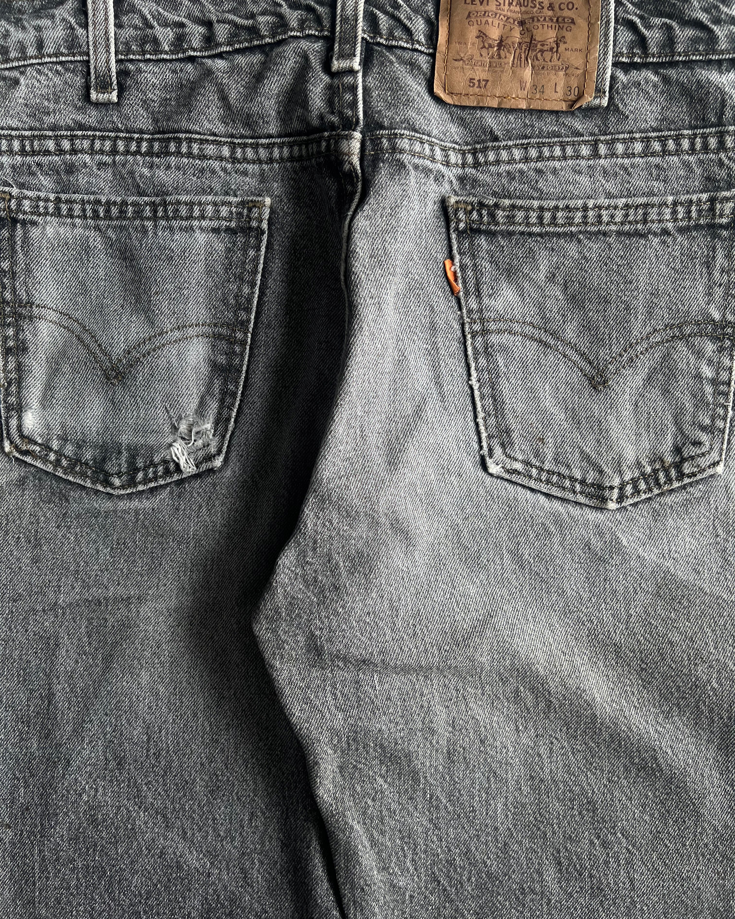 1980S FADED BLACK LEVI'S 517 FLARE JEANS (34X30)