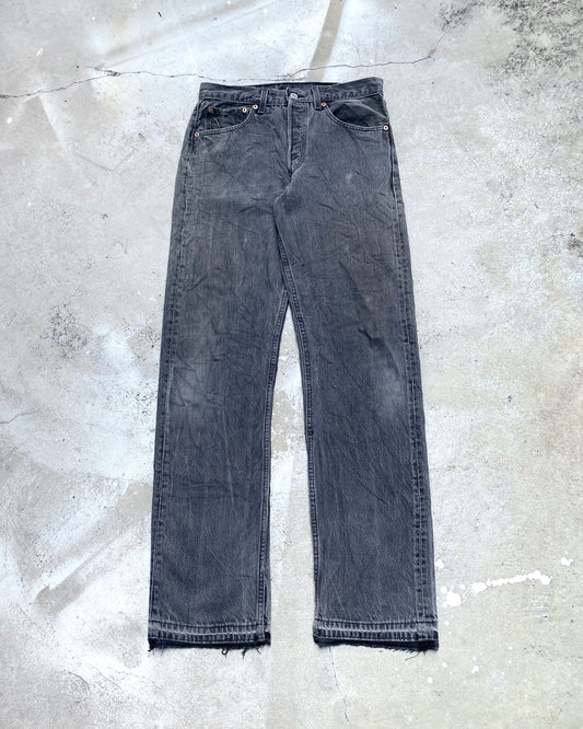 1990S FADED BLACK LEVI'S 501 RELEASED HEM JEANS (31X32)
