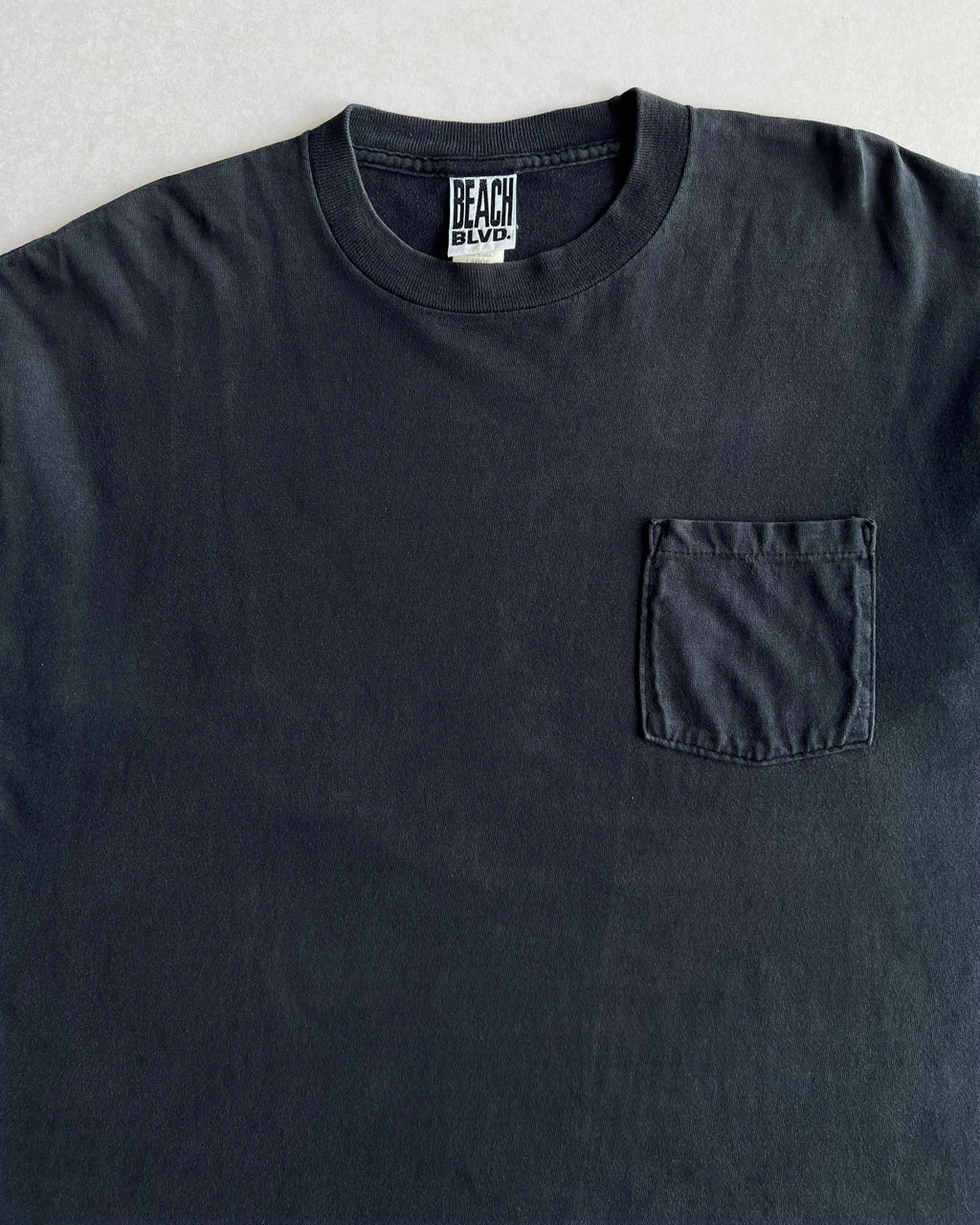 1990S BLACK BLANK SINGLE STITCH POCKET TEE (L)