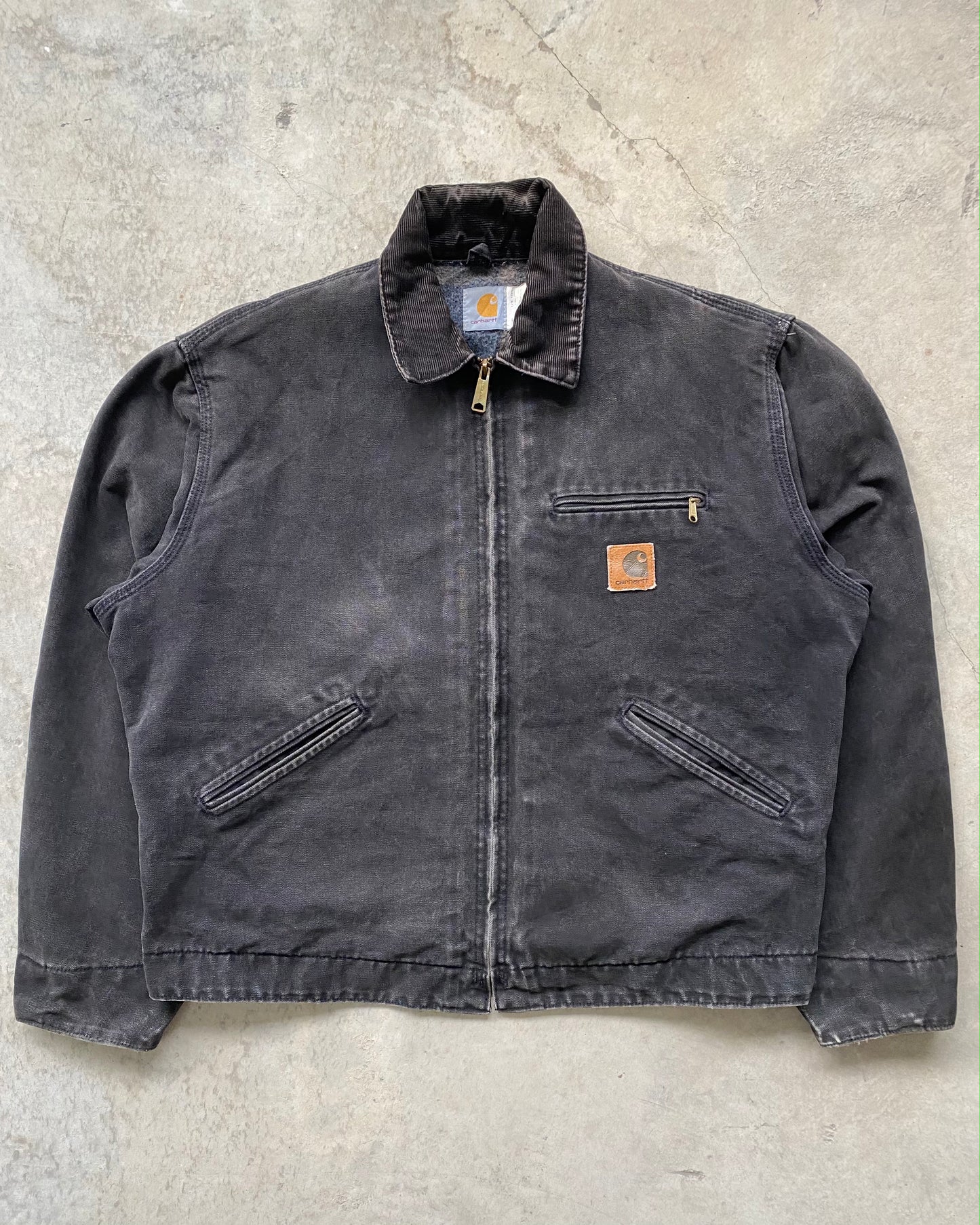 1980S FADED BLACK CARHARTT DETROIT JACKET (L/XL)