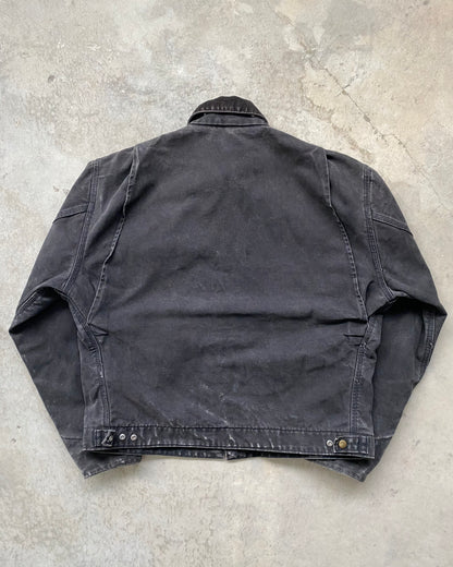 1980S FADED BLACK CARHARTT DETROIT JACKET (L/XL)