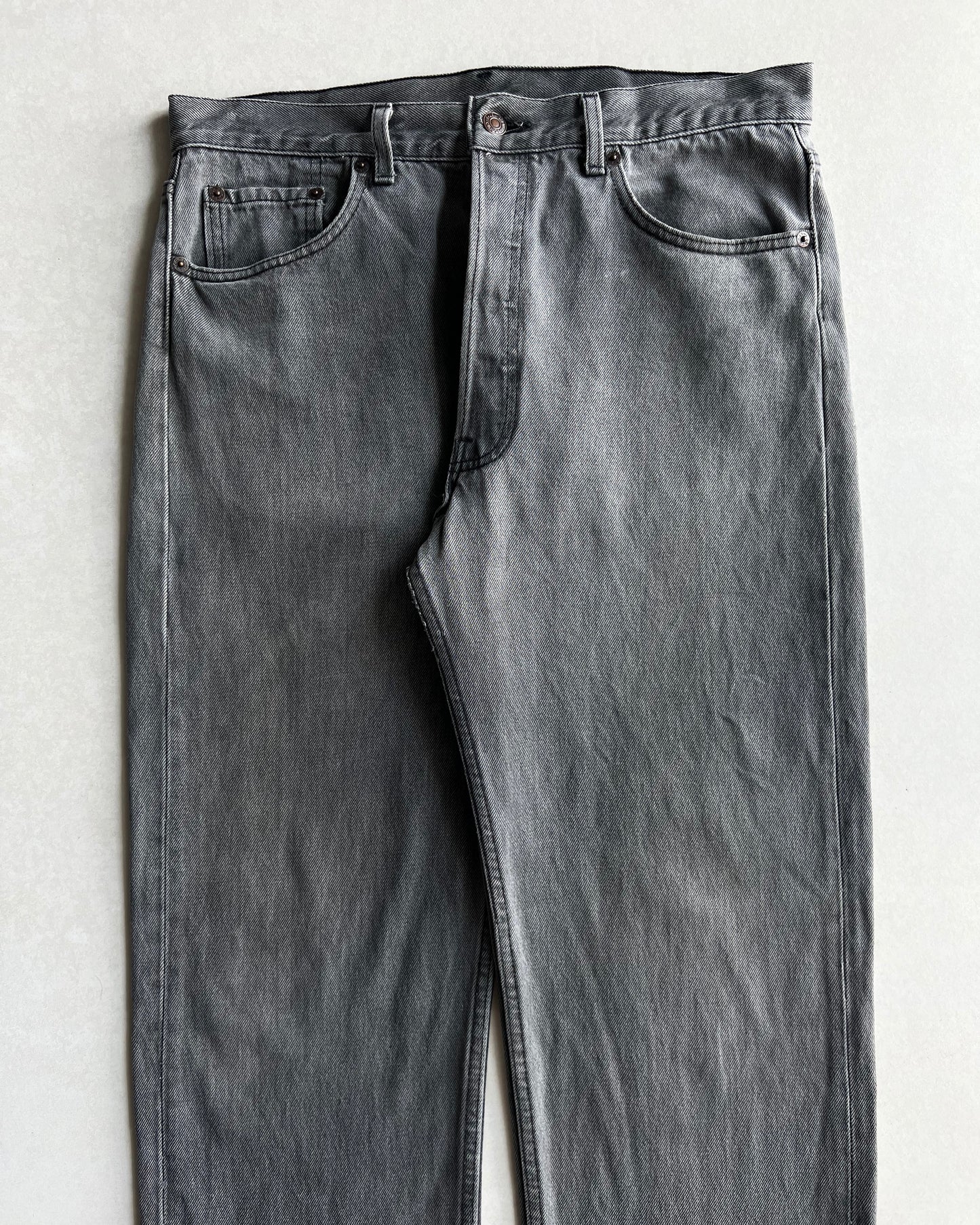 1980S FADED BLACK LEVI'S 501 RELEASED HEM JEANS (33X28)