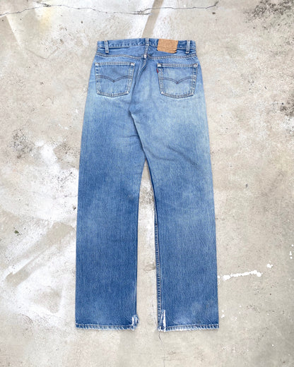 1980S FADED BLUE LEVI'S 501 PATCHED JEANS (31X32)