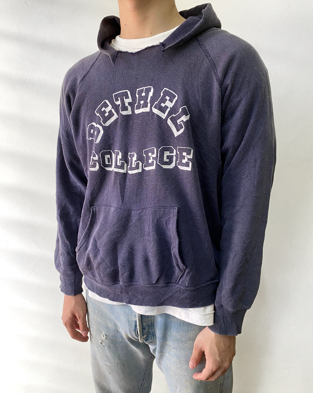 1980S FADED ‘BETHEL COLLEGE’ TORN CHAMPION HOODIE (L)