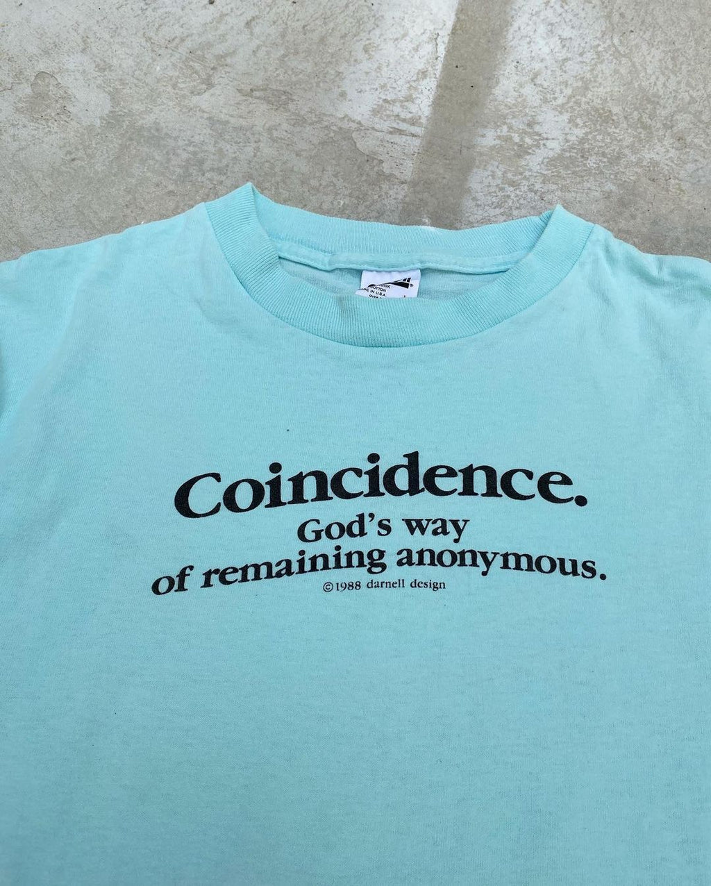 1988 ‘Coincidence. God’s way of remaining anonymous.’ Tee (L)