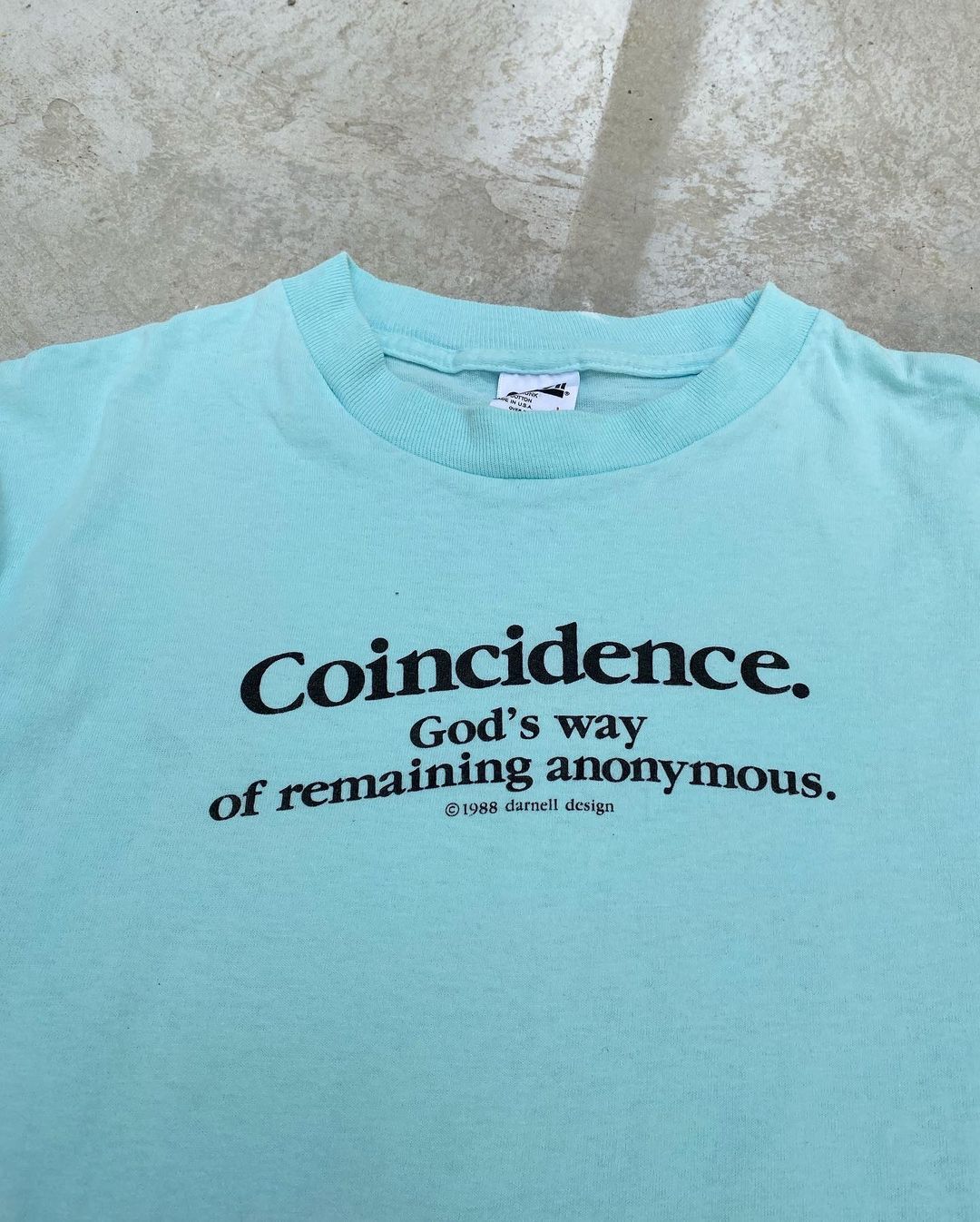1988 ‘Coincidence. God’s way of remaining anonymous.’ Tee (L)