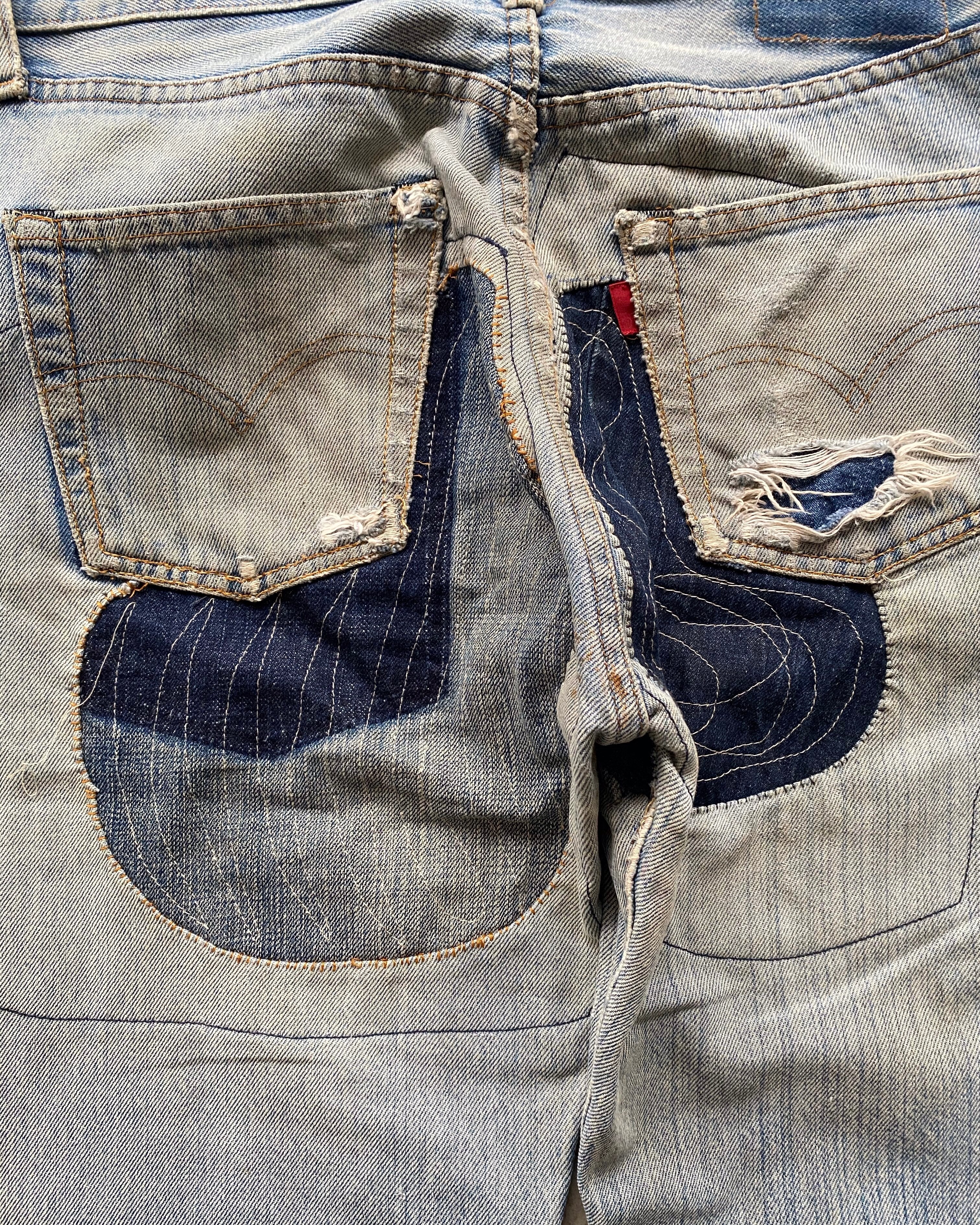 1980S MAJOR REPAIRED LEVI'S 501 REDLINE SELVEDGE JEANS (31X38)