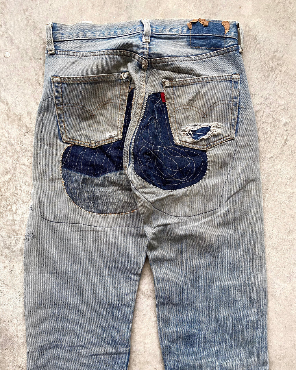 1980S MAJOR REPAIRED LEVI'S 501 REDLINE SELVEDGE JEANS (31X38)