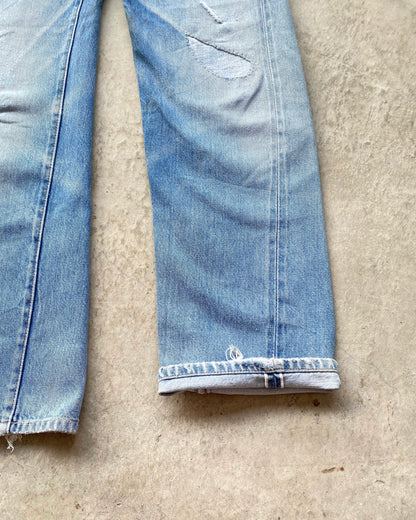 1980S FADED BLUE LEVI'S 501 REDLINE SELVEDGE REPAIRED JEANS (27X32)