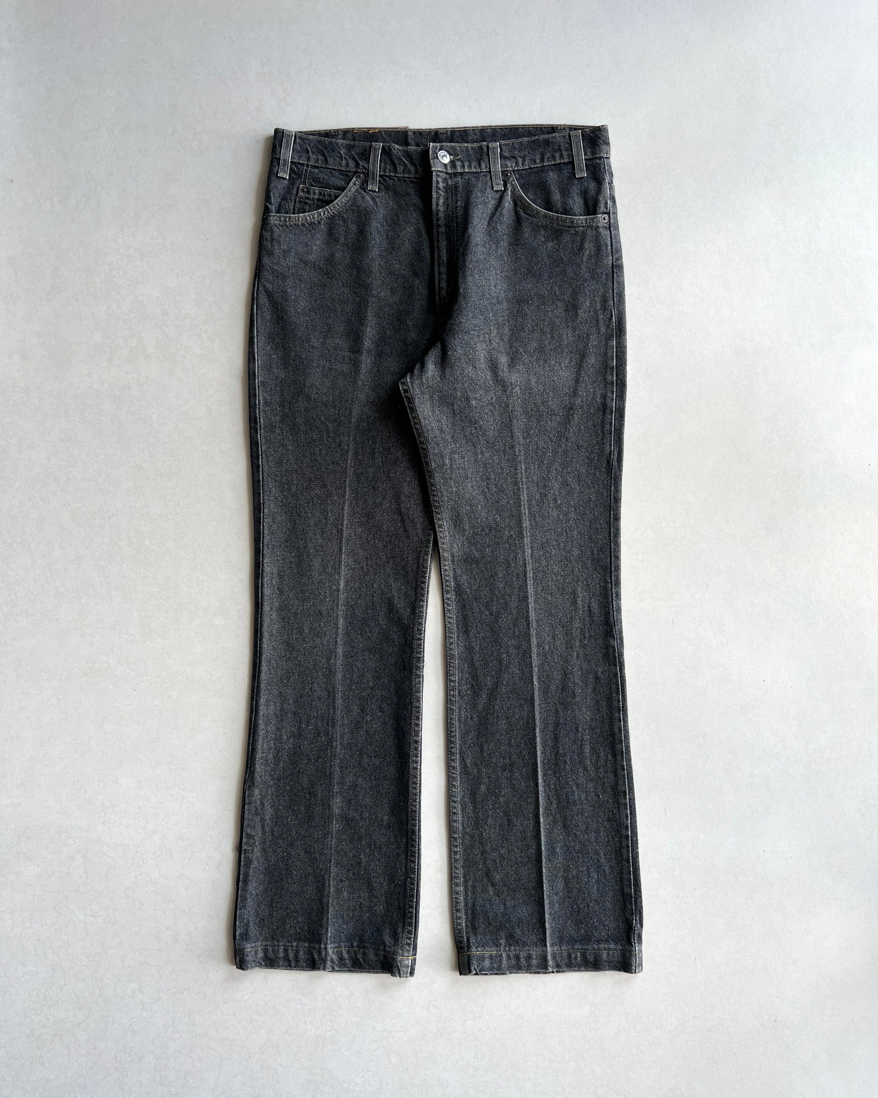 1990S FADED BLACK LEVI'S 517 FLARE JEANS (36X32)