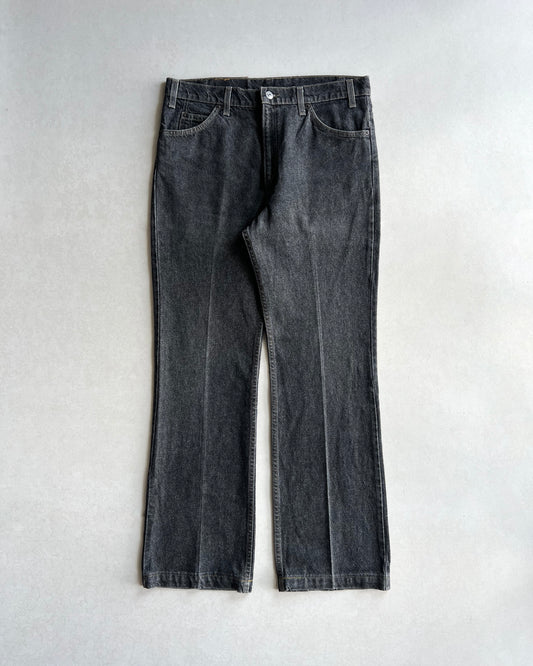 1990S FADED BLACK LEVI'S 517 FLARE JEANS (36X32)