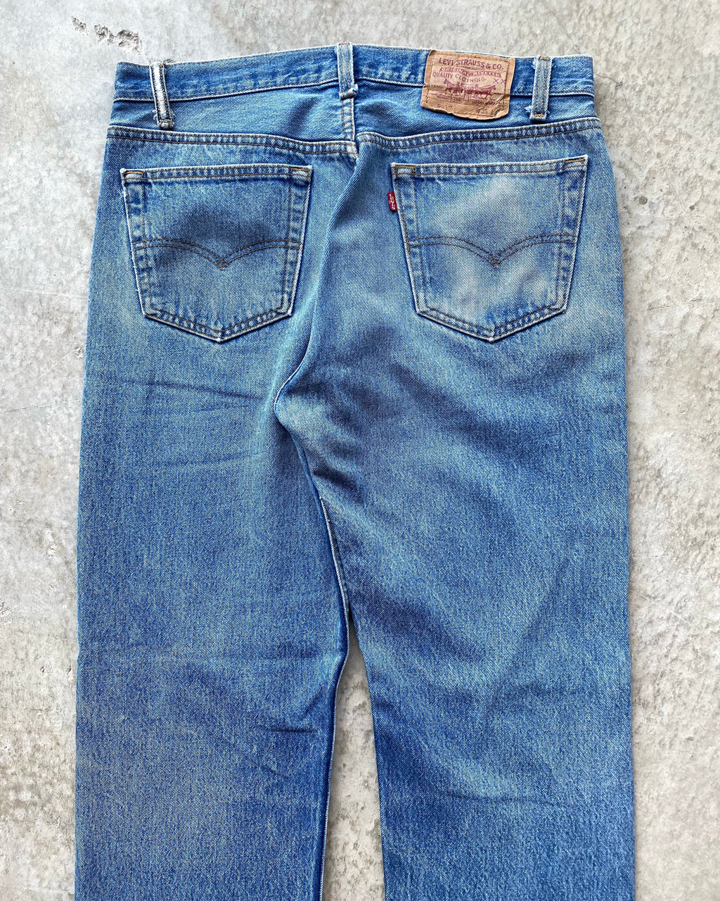 1980S FADED LEVI'S 501 RELEASED HEM JEANS (35X32)