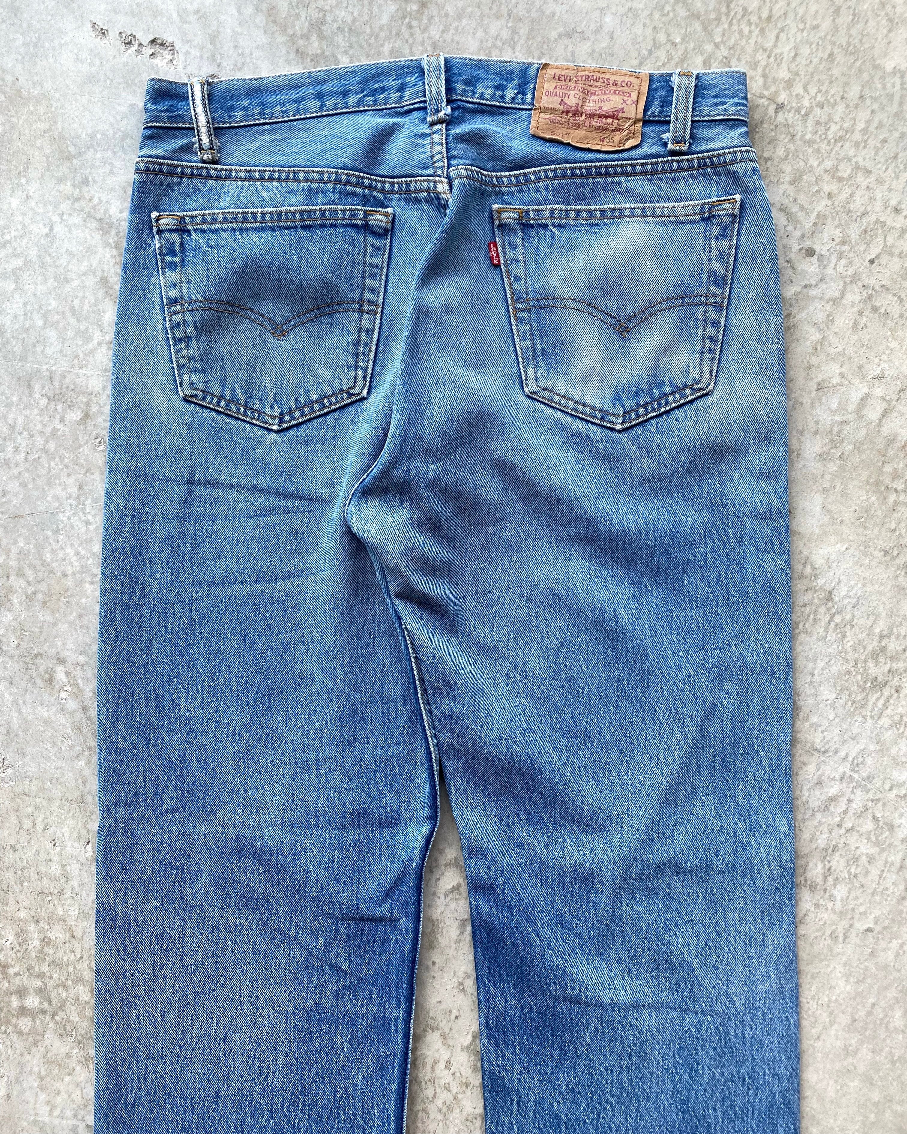 1980S FADED LEVI'S 501 RELEASED HEM JEANS (35X32)