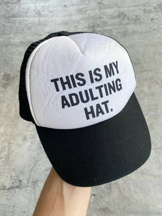 ‘THIS IS MY ADULTING HAT’ TRUCKER HAT