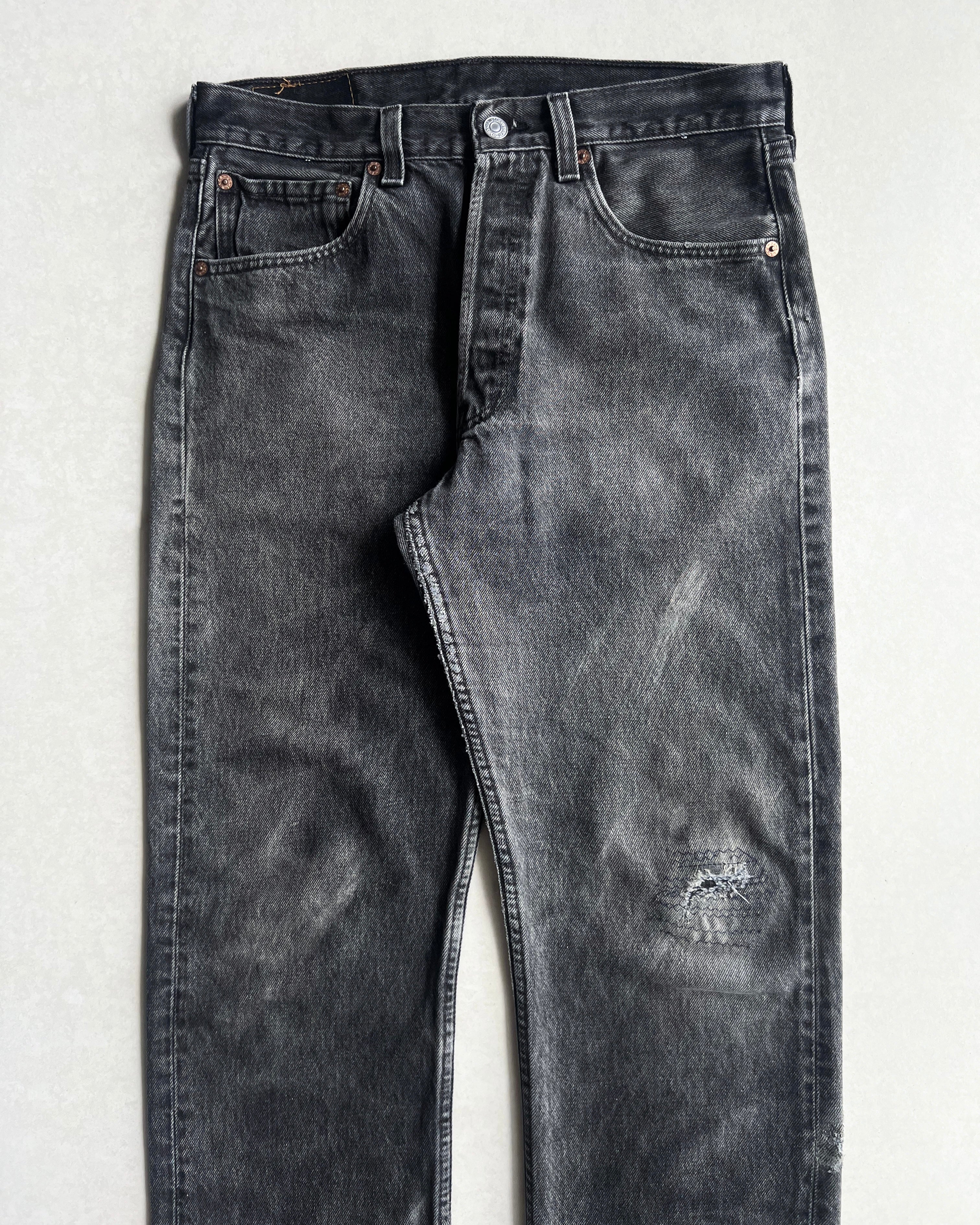 1990S FADED BLACK LEVI'S 501 RELEASED HEM JEANS (31X30)