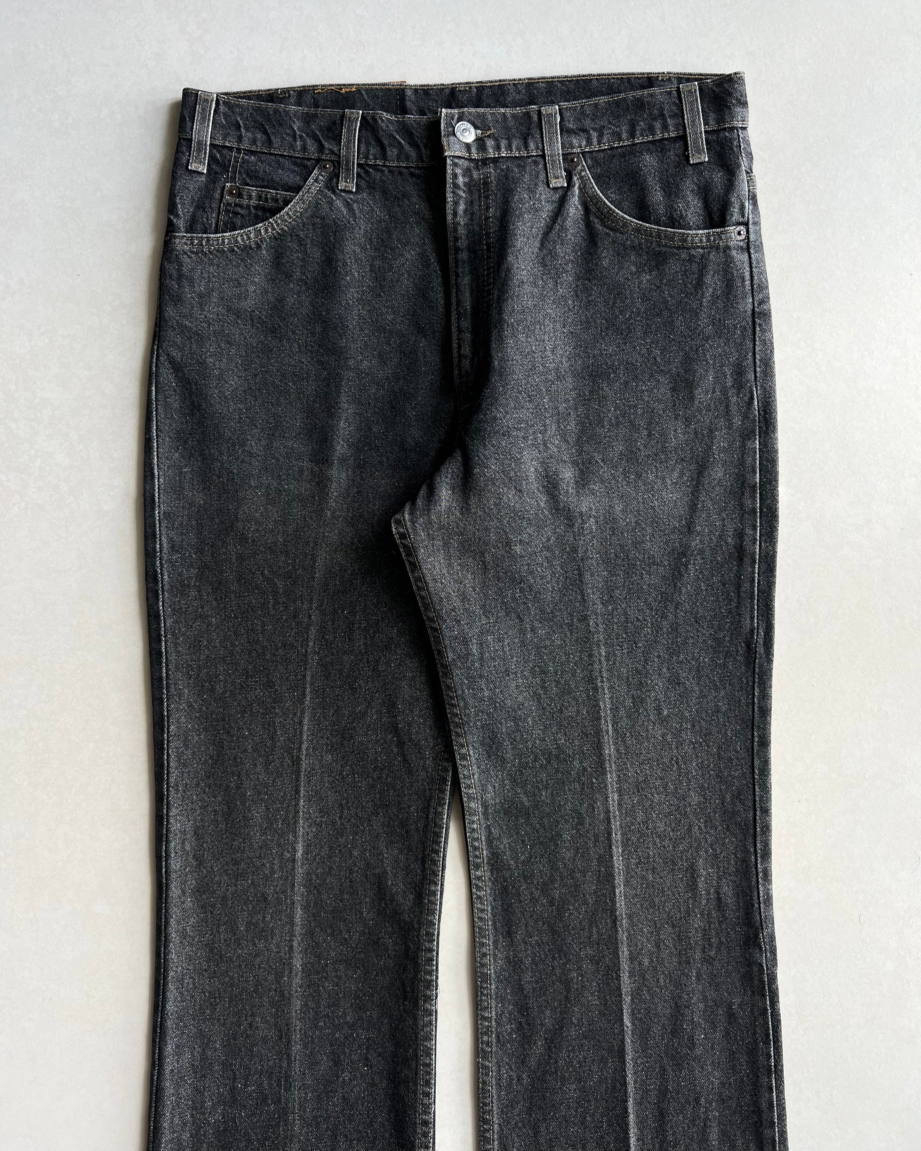 1990S FADED BLACK LEVI'S 517 FLARE JEANS (36X32)