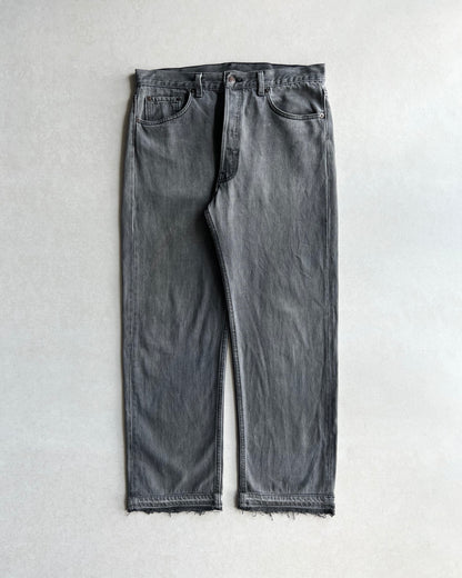 1980S FADED BLACK LEVI'S 501 RELEASED HEM JEANS (33X28)