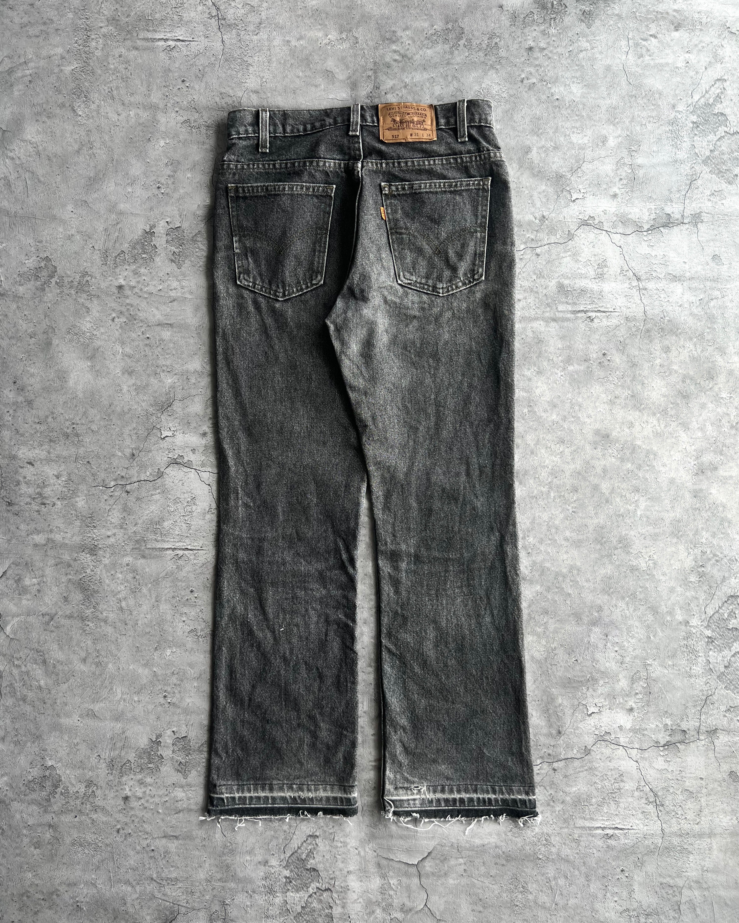 1990S FADED BLACK LEVI'S 517 RELEASED HEM FLARE JEANS (31X34)